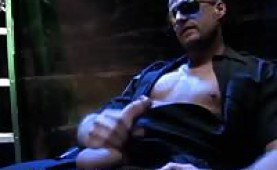 Horny cop stroking his big dick