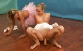 Lesbian ballet girls playing with a toy