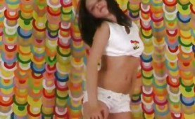 Petite brunette strips and teases