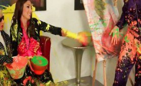 Classy ladies throwing with paint